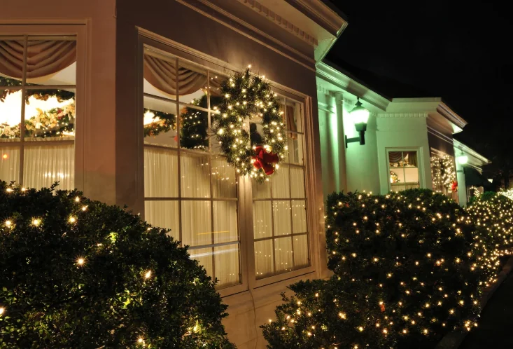 Home decorated with Christmas lights and wreaths — Charlottesville VA